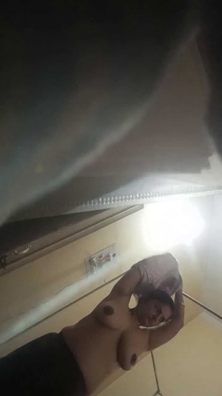 Part 1 of a secret video of a nude milf flaunting her enormous breasts