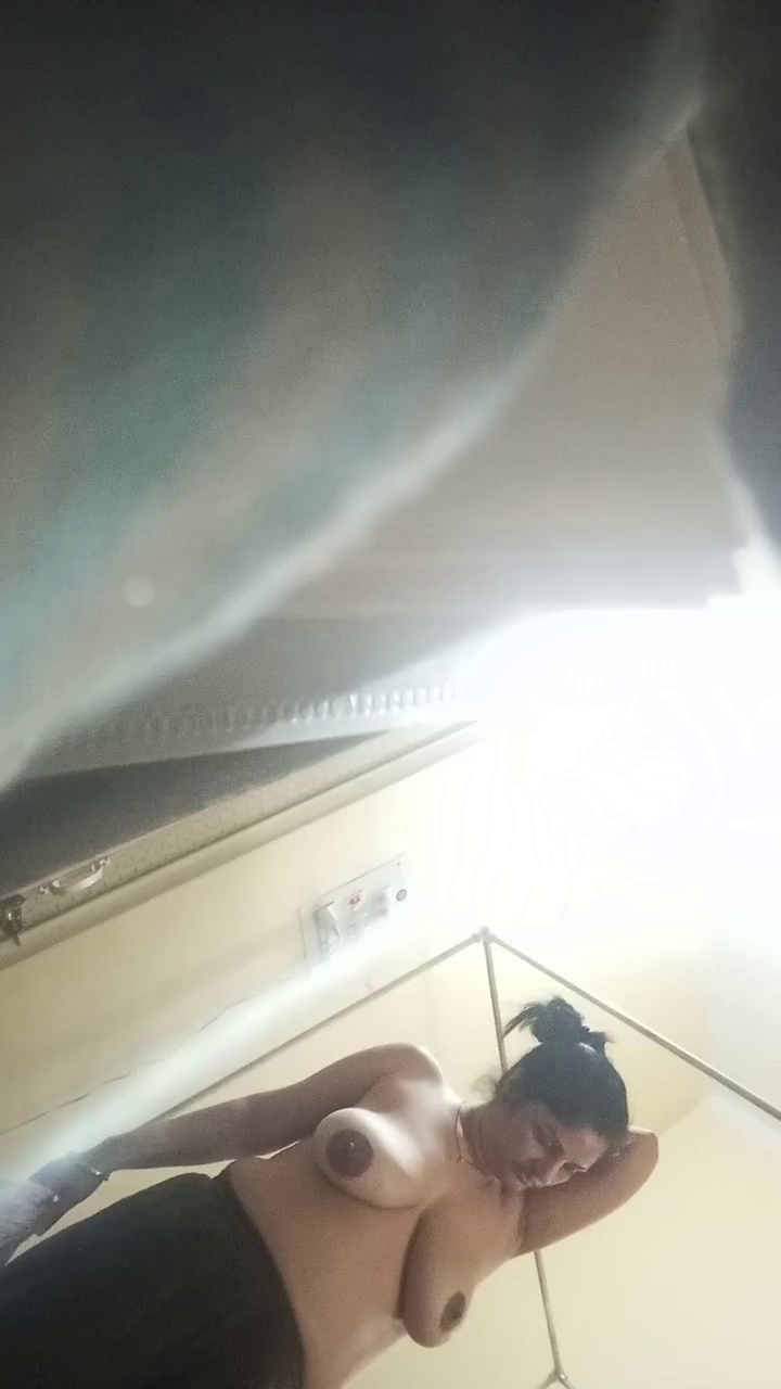 Part 2 of a secret video of a nude milf flaunting her enormous breasts