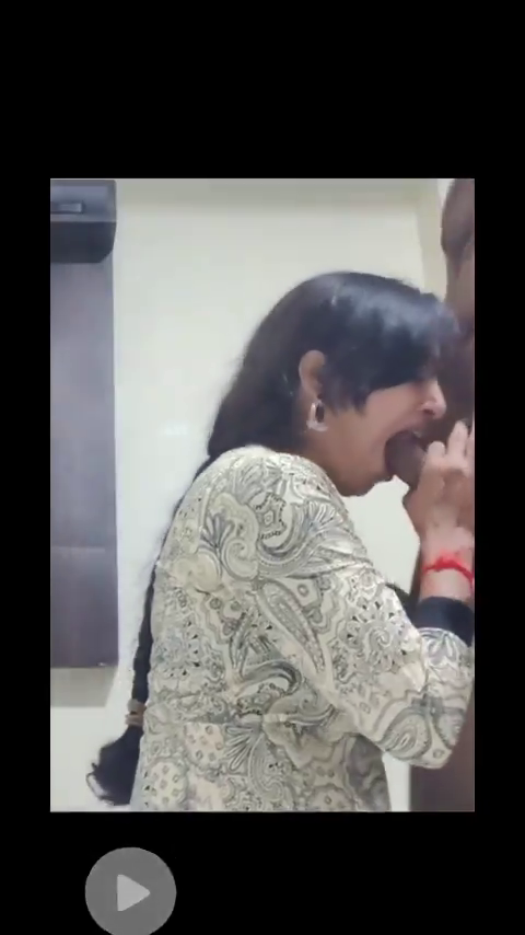 A horny Desi milf is blowjob-fucking a missionary dog and getting cum in her mouth