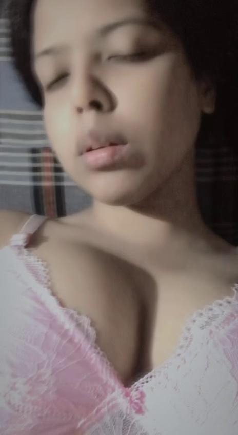 An attractive Indian woman flashing her enormous breasts and used pussy