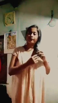 A Bengali village girl flaunting her enormous breasts